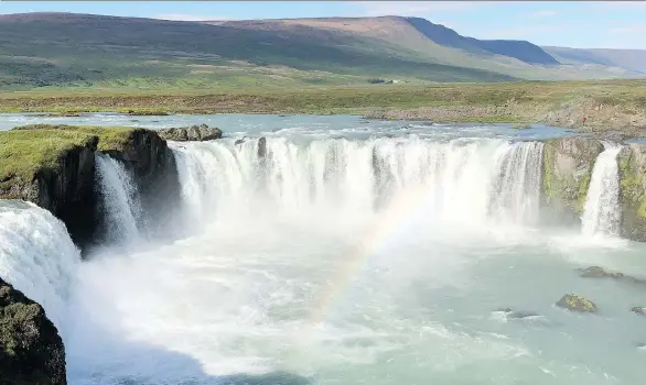  ?? PHOTOS: TIM JOHNSON ?? The tumbling majesty of Godsfoss — waterfall of the gods — is just one of many stunning sights in a country of abundant natural wonders.