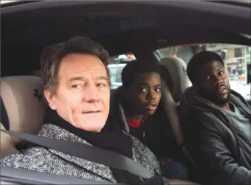  ?? Associated Press photo ?? This image released by STXfilms shows Bryan Cranston, from left, Jahi Di’Allo Winston and Kevin Hart in a scene from “The Upside.”