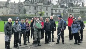  ??  ?? Members of East Cheshire Ramblers pausing outside Tissington Hall