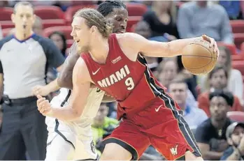  ?? LYNNE SLADKY/AP ?? Kelly Olynyk will be sporting a shorter haircut this fall as he will have his locks trimmed for Wigs for Kids.