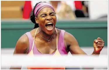  ?? CLIVE BRUNSKILL / GETTY IMAGES ?? Serena Williams celebrates match point in her 5-7, 6- 3, 6- 3 second-round victory over Anna-Lena Friedsam on Thursday. Williams committed 52 unforced errors while struggling with her serve because of elbow pain.