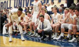  ?? TIM PHILLIS — THE NEWS-HERALD ?? John Carroll’s Pete Moran was named the Ohio Athletic Conference men’s basketball coach of the year in his first season as head coach of the Blue Streaks.