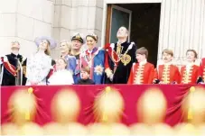  ?? ?? The Royal Family come out onto the Buckingham Palace balcony to view the Royal Air Force fly-past in central London