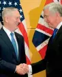  ?? AFP ?? US Defence Secretary Jim Mattis shakes hands with British Secretary for Defence Michael Fallon during a meeting in Brussels.—