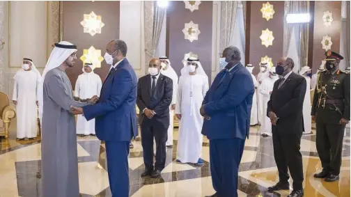  ?? WAM ?? ↑
Sudan’s Sovereign Council Chairman Lt General Abdel Fattah Al Burhan (second left) offers his condolence­s to Sheikh Mohamed Bin Zayed Al Nahyan in Abu Dhabi.