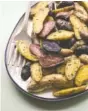  ?? THE ASSOCIATED PRESS ?? Herb Roasted Fingerling Potatoes cook in about 25 minutes.