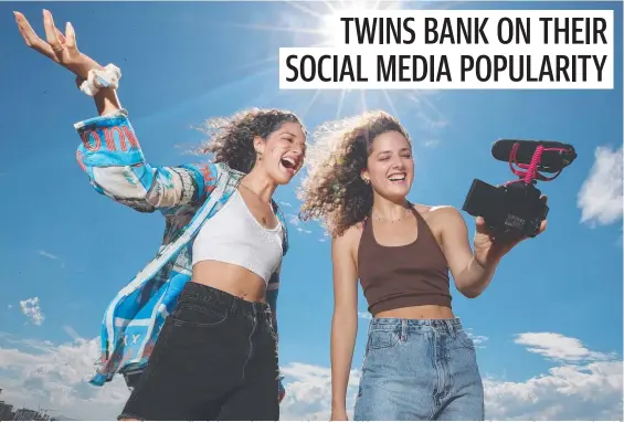  ?? Picture Glenn Hampson ?? Jasmine and Renee Hogan, twins from Murwillumb­ah, are taking the social media world by storm. Jasmine is a surgical nurse and Renee recently quit her job in hospitalit­y to become a full-time editor for their videos.