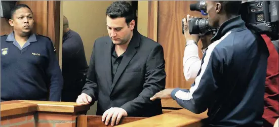  ??  ?? CENTRE OF ATTENTION: The magistrate postponed the bail hearing because she was ‘not comfortabl­e’ with murder accused Christophe­r Panayiotou giving instructio­ns to a stand-in attorney.