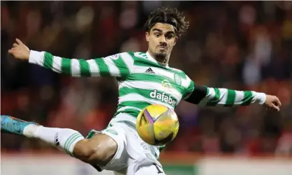  ?? ?? Jota scores Celtic’s third goal after Aberdeen had come back from 2-0 down. Photograph: Russell Cheyne/Reuters