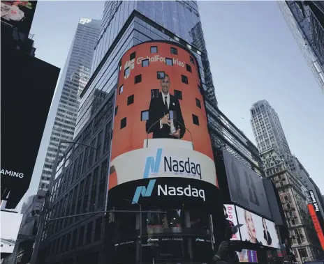  ?? Mubadala ?? Mubadala chief Khaldoon Al Mubarak on the Nasdaq screen in New York after GlobalFoun­dries listed in the US