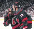  ?? USA TODAY SPORTS ?? Hurricanes centre Sebastian Aho, right, celebrates his goal with defenceman Brady Skjei.