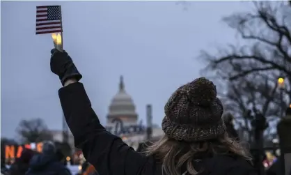  ?? ?? A vigil near the US Capitol on the anniversar­y of the 6 January 2021 attack on the Capitol by supporters of former President Donald Trump. Photograph: Probal Rashid/ZUMA Press Wire/REX/Shuttersto­ck