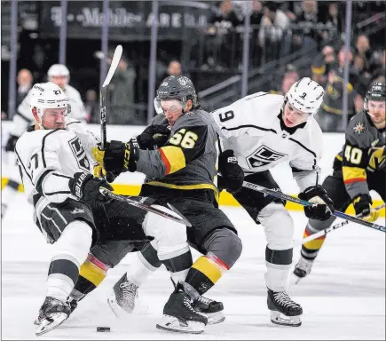  ?? Patrick Connolly ?? Las Vegas Review-journal @Pconnpie Los Angeles Kings defenseman Alec Martinez (27) and Golden Knights left wing Erik Haula (56) get tangled up while chasing the puck during a Feb. 27 game at T-mobile Arena. The Knights and Kings will meet in a first-round playoff opener Wednesday at T-mobile Arena.