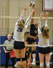  ?? BARRY TAGLIEBER — FOR DIGITAL FIRST MEDIA ?? Boyertown’s Olivia Hurley and Susannah Lynn defend against Pope John Paul II’s Mikaela Monroe.