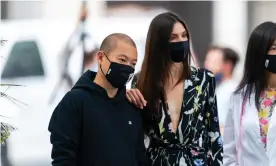  ?? Photograph: Gotham/GC Images ?? Designer Jason Wu (left) with American model Jacquelyn Jablonski as he prepares to open New York fashion week with a scaled-down rooftop catwalk for 30 people.