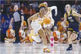  ?? AP PHOTO/WADE PAYNE ?? Tennessee guard Jasmine Powell (15) drives the ball upcourt Monday during an NCAA tournament second-round game against Toledo in the NCAA Tournament in Knoxville.