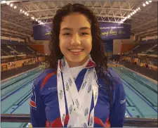  ??  ?? Daniella Farrell with her 2 golds and 2 bronze medals.