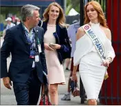  ??  ?? Maëva Coucke, Miss France , n’a laissé personne indifféren­t, à commencer par le pilote Charles Leclerc (ci-dessous).