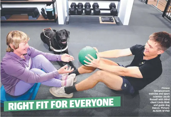  ?? ?? Fitness Advancemen­t exercise and sport scientist Jacob Russell with blind client Linda Blaik and guide dog Daicos. Picture: ALISON WYND