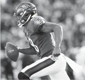  ?? CAROLYN KASTER/ASSOCIATED PRESS ?? Lamar Jackson proved to be one of the most effective running quarterbac­ks in NFL history in his rookie season. He’ll look to improve his ball security and passing accuracy in 2019.