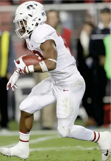  ?? (Photo by Marcio Jose Sanchez, AP) ?? Stanford running back Bryce Love runs against Southern California during the first half of the Pac-12 Conference championsh­ip earlier this month.