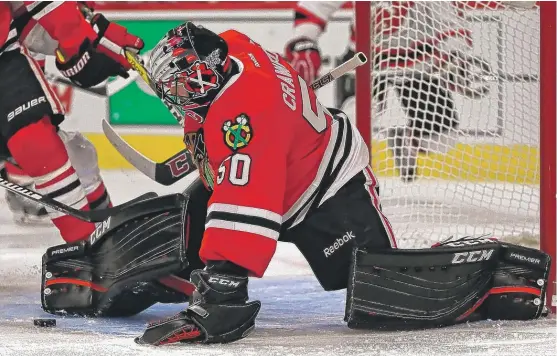  ?? | JONATHAN DANIEL/ GETTY IMAGES ?? Goalie Corey Crawford was scheduled to start Saturday, but he missed the game after having an emergency appendecto­my at a Philadelph­ia hospital.