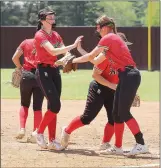  ?? Photograph­s courtesy of Samantha Huffman ?? Lady Blackhawks encourage pitcher Aidan Dayberry, No. 3, during the Friday game in Morrilton.