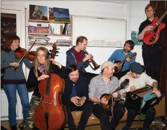  ?? PHOTOGRAPH NADJA HALLSTROM ?? Left: Musician James Yorkston near his home in Cellardyke, Fife, and, above, with The Second Hand Orchestra