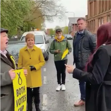  ??  ?? Nicola Sturgeon is confronted outside a polling station by Jayda Fransen