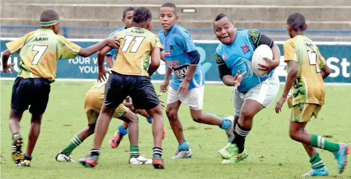  ?? Photo: Paulini Ratulailai ?? PICTURED: Kaji rugby action between PNC Suva and Lami in the Under-10 grade at the ANZ Stadium yesterday.