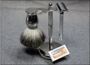  ?? RICHARD DREW - THE ASSOCIATED PRESS PHOTO ?? This photo shows a Col. Ichabod Conk shave set and Merkur double-edge razor blades. Remember the oldschool safety razor your grandfathe­r used? It’s making a comeback. Trendy direct-to-consumer brands have reintroduc­ed them to younger generation­s.