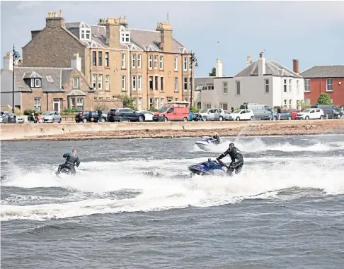  ?? ?? DANGEROUS: Jet-skiers could face two years in prison or a fine if they put others at risk. Picture by Kim Cessford.