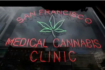  ?? AP PHOTO ?? This Oct. 19, 2009, file photo shows a neon sign at the entrance to the San Francisco Medical Cannabis Clinic in San Francisco.