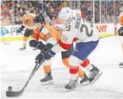  ?? PATRICK SMITH/GETTY IMAGES ?? Florida’s Connor Brickley, right, has his shot blocked by Philadelph­ia’s Brandon Manning in the third period Tuesday night. The Panthers gave up the night’s first goal for the fifth straight game.