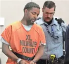  ?? RICK WOOD / MILWAUKEE JOURNAL SENTINEL ?? Ladell Harrison enters court Friday on charges related to a squad crash that killed Officer Charles Irvine Jr.