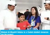  ??  ?? Waleed Al-Khashti listens to a Coded student showcasing his project.