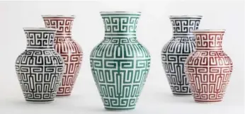  ?? ENRICO CONTI ?? Vases from the Labirinto collection from design house Richard Ginori inject elegance and pattern into any space.