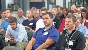  ?? MICHAEL SEARS / MILWAUKEE JOURNAL SENTINEL ?? People in the audience listen to the panel.