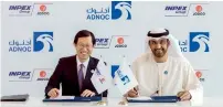  ?? Supplied photo ?? Dr Sultan Ahmed Al Jaber, Adnoc Group CEO and member of Abu Dhabi’s Supreme Petroleum Council, and Toshiaki Kitamura, president and chief executive officer of Inpex, signing the agreement. —