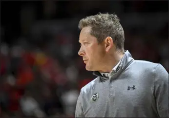  ?? AARON ONTIVEROZ — THE DENVER POST ?? Colorado State head coach Niko Medved Rams works during the second half on Friday against New Mexico at the Thomas & Mack Center in Las Vegas.