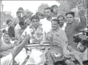  ??  ?? Rakesh Daultabad, independen­t candidate from Badshahpur who won the assembly seat, at a victory procession in Sector 14, Gurugram on Thursday. YOGENDRA KUMAR/HT