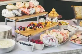  ??  ?? At the Corinthia Palace the dessert trolley is overflowin­g with a delicious choice