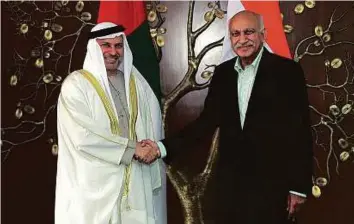  ?? Courtesy: India’s Ministry of External Affairs ?? Dr Anwar Mohammad Gargash and M.J. Akbar after the First India-UAE Strategic Dialogue in New Delhi yesterday. They co-chaired the dialogue held between the countries’ foreign offices.