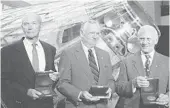  ?? JOYCE NALTCHAYAN/GETTY-AFP ?? Michael Collins, Neil Armstrong and Buzz Aldrin accept the Samuel P. Langley medal on July 20, 1999, at the National Air and Space Museum in Washington, D.C.