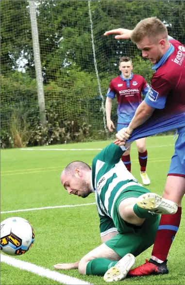  ?? Picture: Larry McQuillan ?? Drogheda United’s Jack Bayly and Adam Wixted put pressure on Evergreen player Robert Quan during Sunday’s FAI Cup tie in Kilkenny.