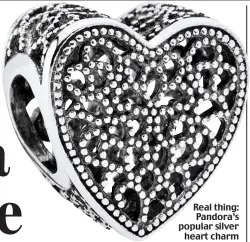  ??  ?? Real thing: Pandora’s popular silver heart charm
