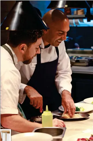  ??  ?? CULINARY CHALLENGE: Amar Latif in his MasterChef apron, left, and, above, with Lello Favuzzi, head chef at London restaurant Mortimer House, on the show