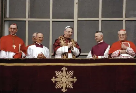  ?? PHOTOS BY THE ASSOCIATED PRESS ?? Pope John Paul I smiles as he appears at the central lodge of St. Peter’s Basilica at The Vatican soon after his election on Aug. 26, 1978. On Sunday, Pope Francis will beatify John Paul I, the last formal step on the path to possible sainthood.