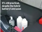  ??  ?? It’s still practical, despite the hybrid battery’s intrusion