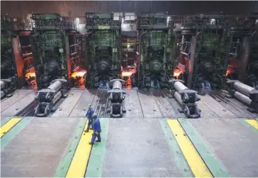  ?? NEW YORK TIMES FILE PHOTO ?? Workers are shown at the Nucor steel mill in Huger, S.C., in April 2017. The February 2018 job numbers could establish a baseline to measure the impact of President Donald Trump’s steel and aluminum tariffs over the coming months.